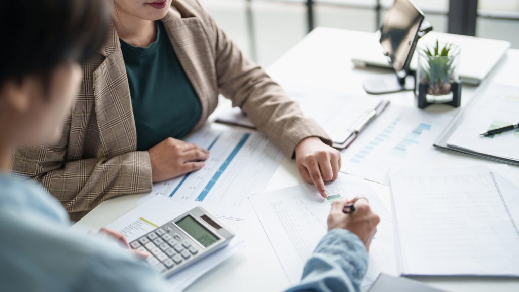 business man Auditor or internal revenue service staff checking annual financial statements company Audit  Accounting tax